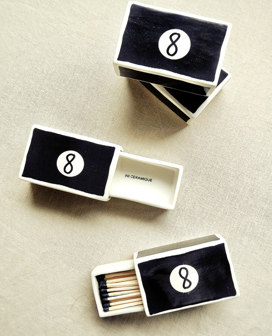 Hand-illustrated ceramic matchbox with 8 Ball illustration