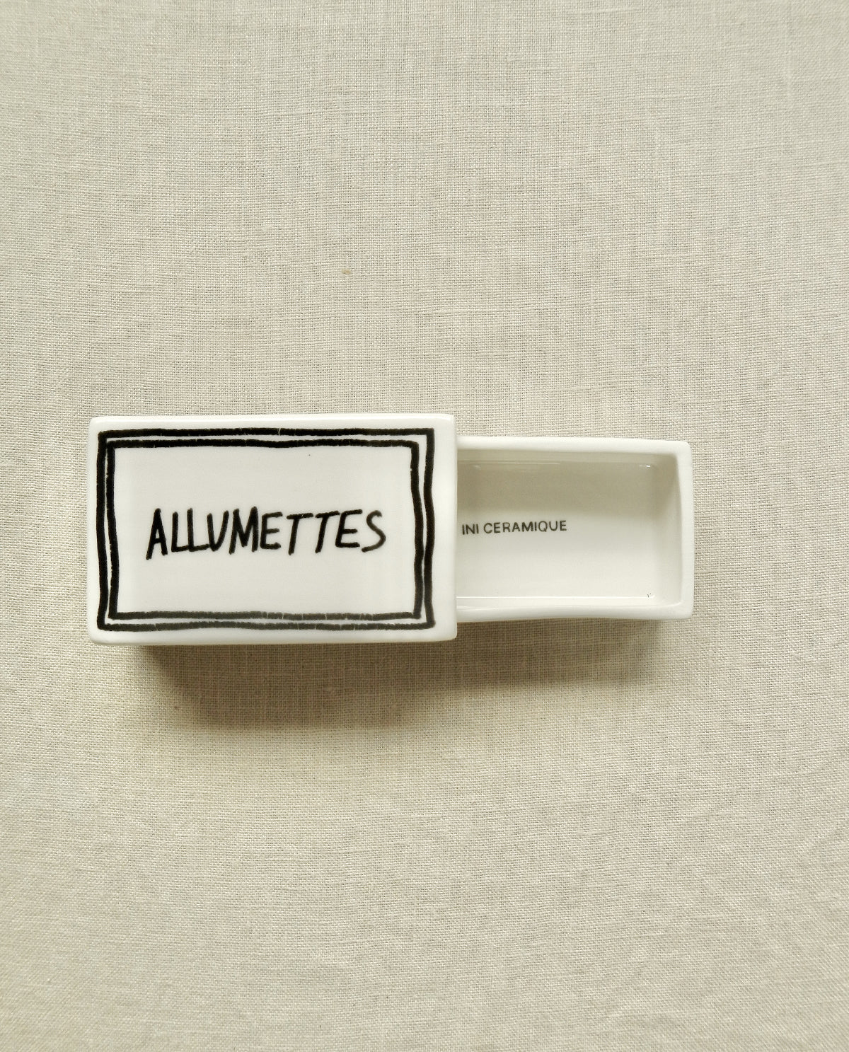 Ceramic matchbox with handwritten “Allumettes” design
