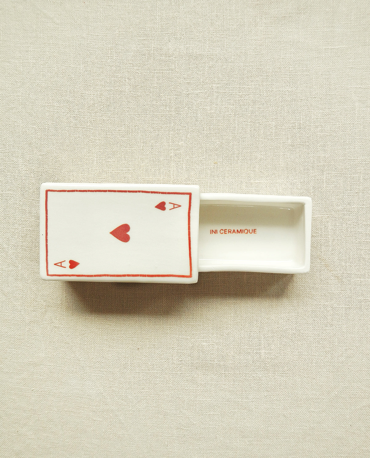 Ceramic matchbox with hand-drawn Ace of Hearts illustration