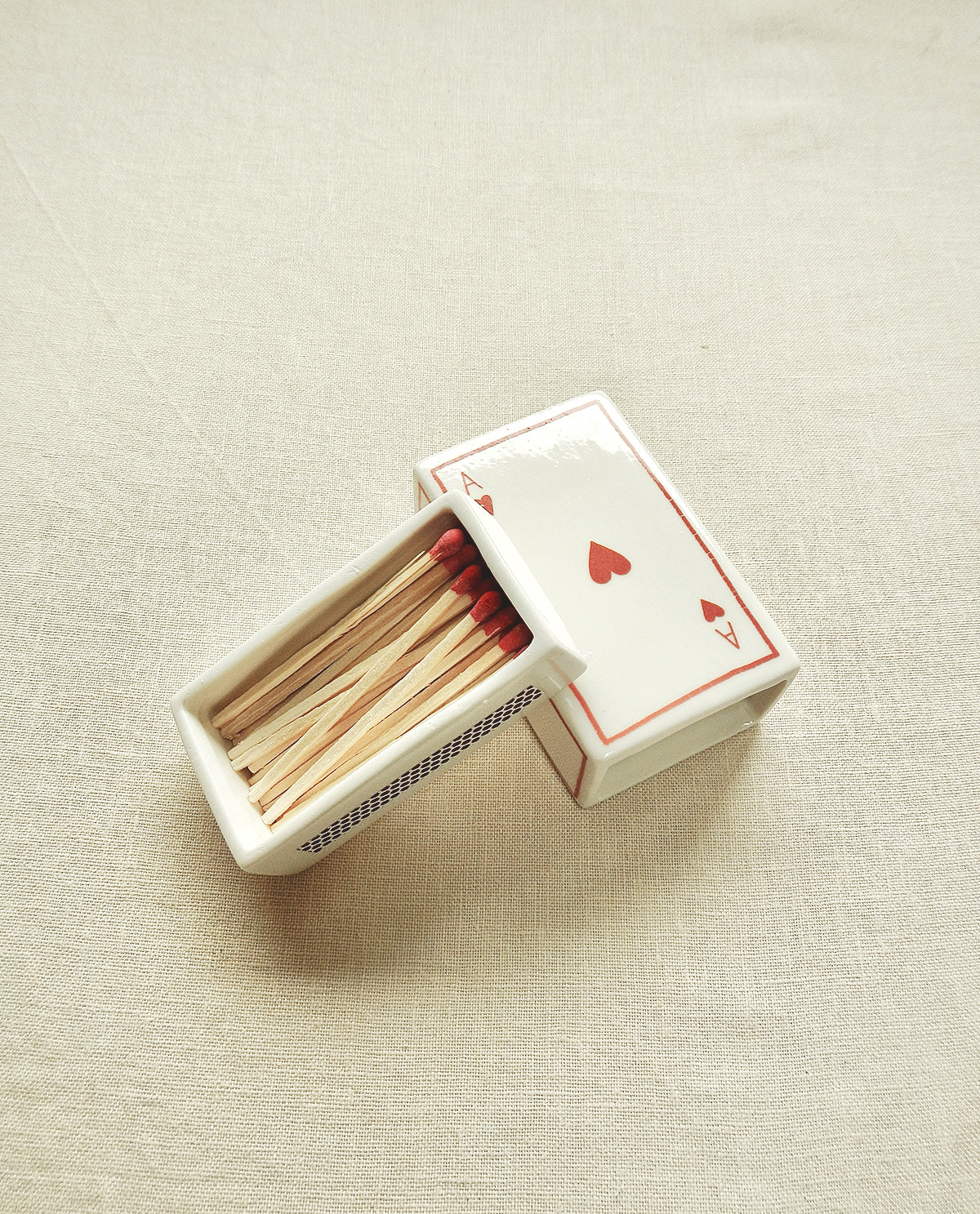 Ceramic matchbox with hand-drawn Ace of Hearts illustration