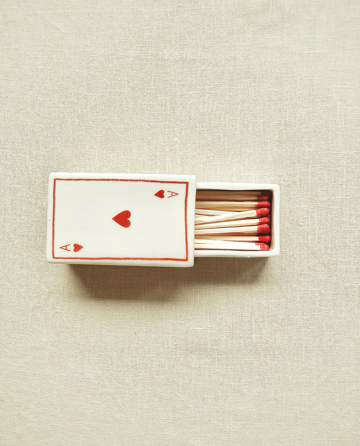 Ceramic matchbox with hand-drawn Ace of Hearts illustration