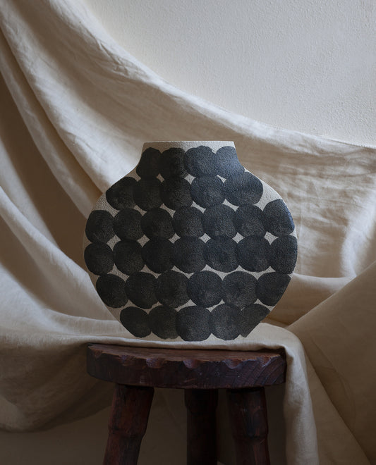 Hand-painted abstract vase by INI CERAMIQUE with geometric round patterns and textured finish