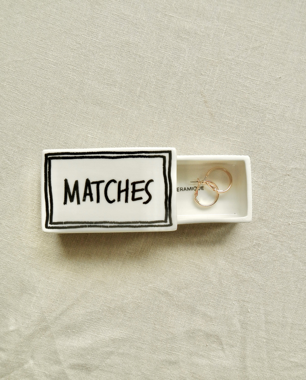 Ceramic matchbox with handwritten “Matches” design