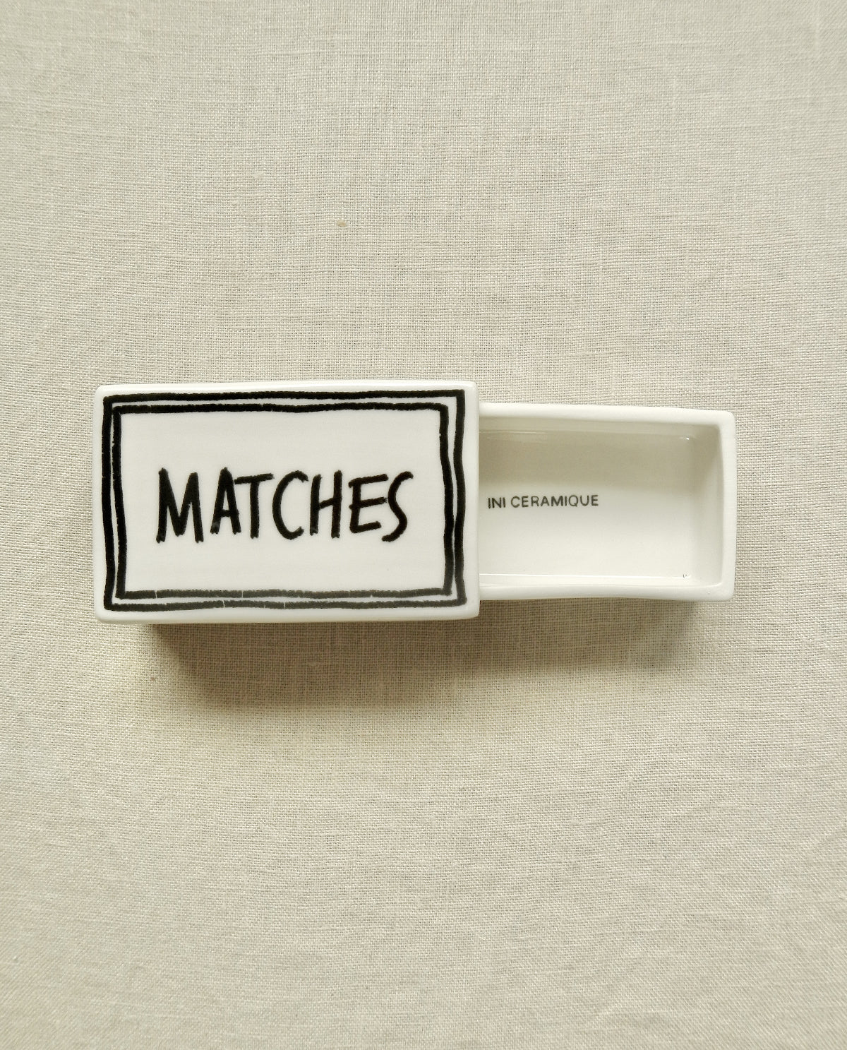 Ceramic matchbox with handwritten “Matches” design