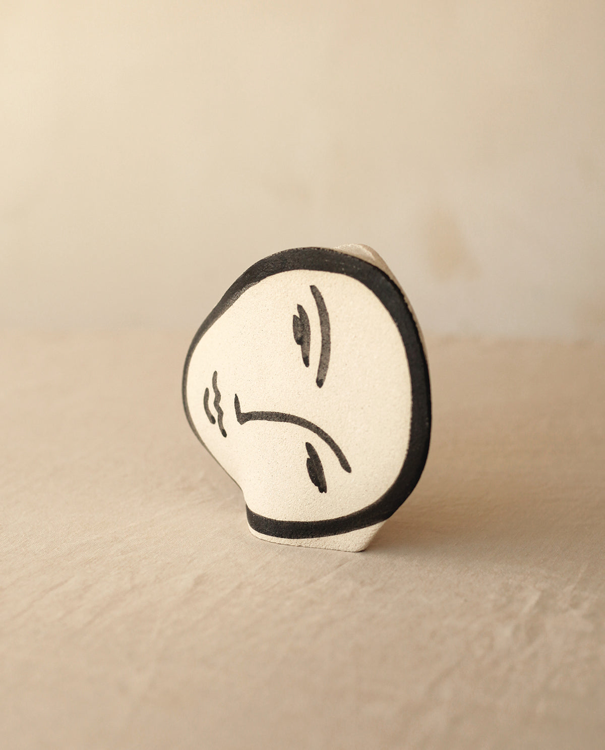 ‘Matisse Face’ Vase - Handmade Stoneware
Inspired by Matisse, this handcrafted stoneware vase features black underglaze motifs on a raw, textured surface. Fired at 1250°C with a transparent glazed interior, each piece is unique, with subtle variations in shape and color.