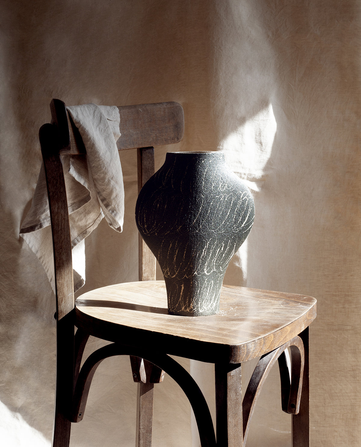 Hand-painted abstract vase by INI CERAMIQUE with geometric patterns and textured finish