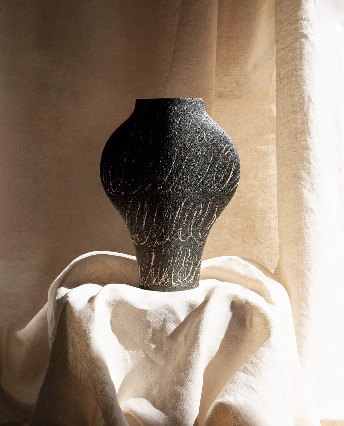 Hand-painted abstract vase by INI CERAMIQUE with geometric patterns and textured finish