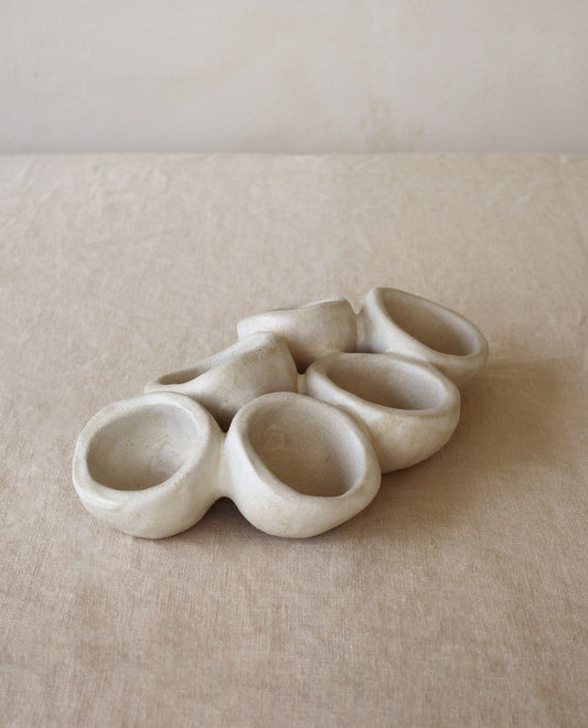Handmade ceramic plate by INI CERAMIQUE featuring an original organic design and matte cream finish