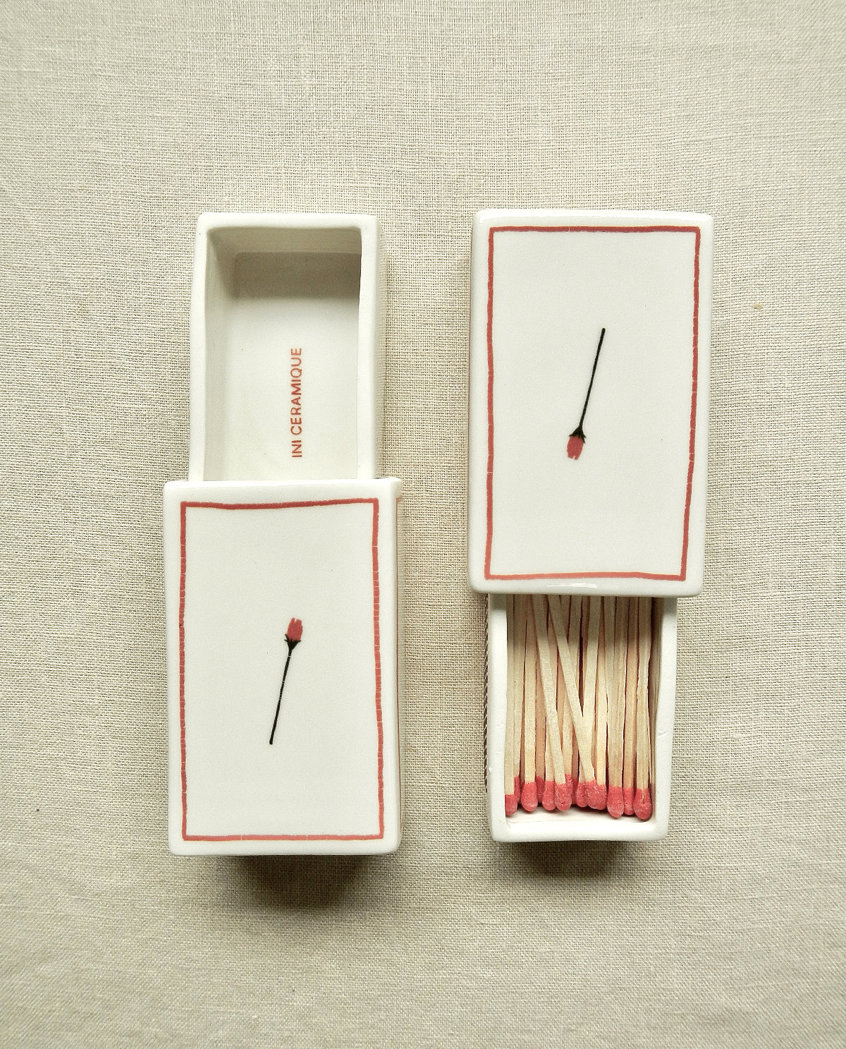Ceramic matchbox with hand-drawn rose illustration