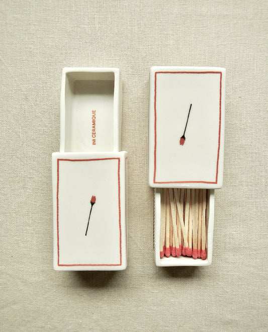 Ceramic matchbox with hand-drawn rose illustration