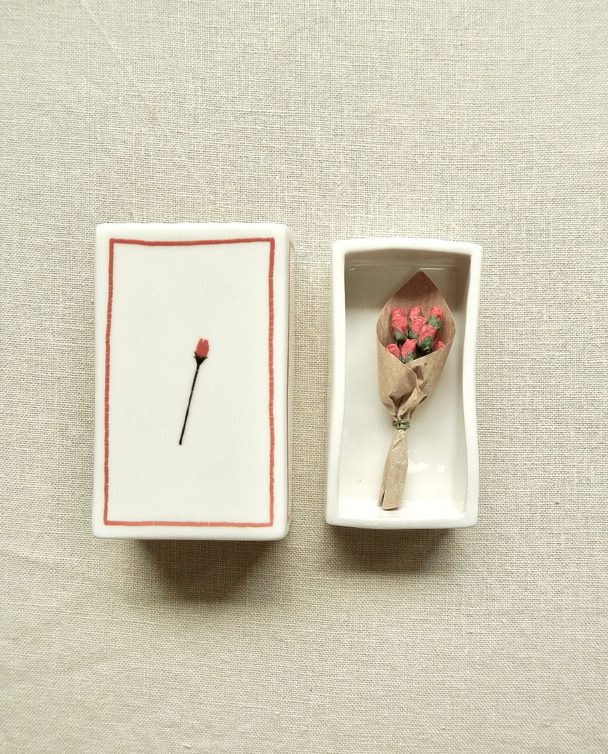 Ceramic matchbox with hand-drawn rose illustration