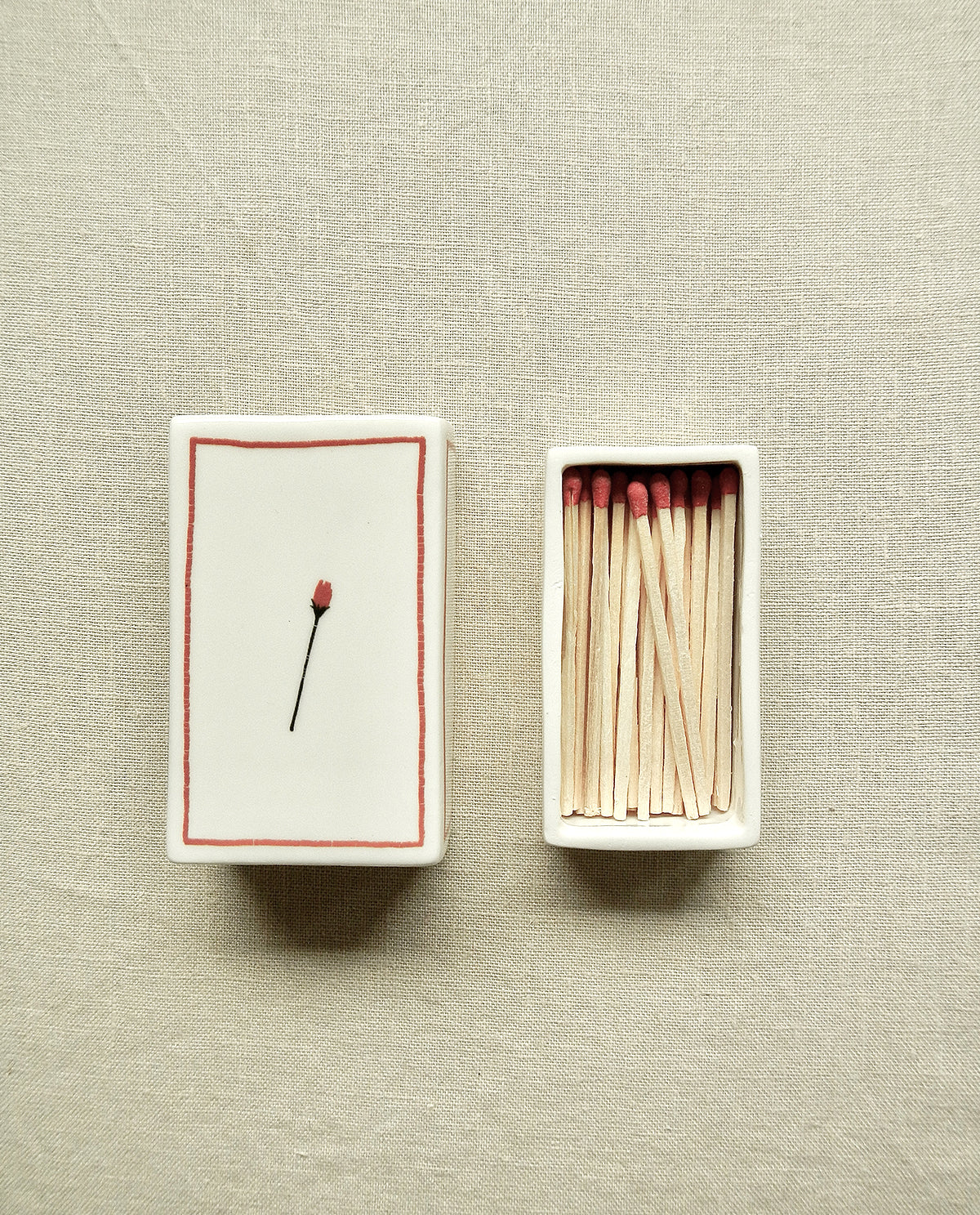 Ceramic matchbox with hand-drawn rose illustration