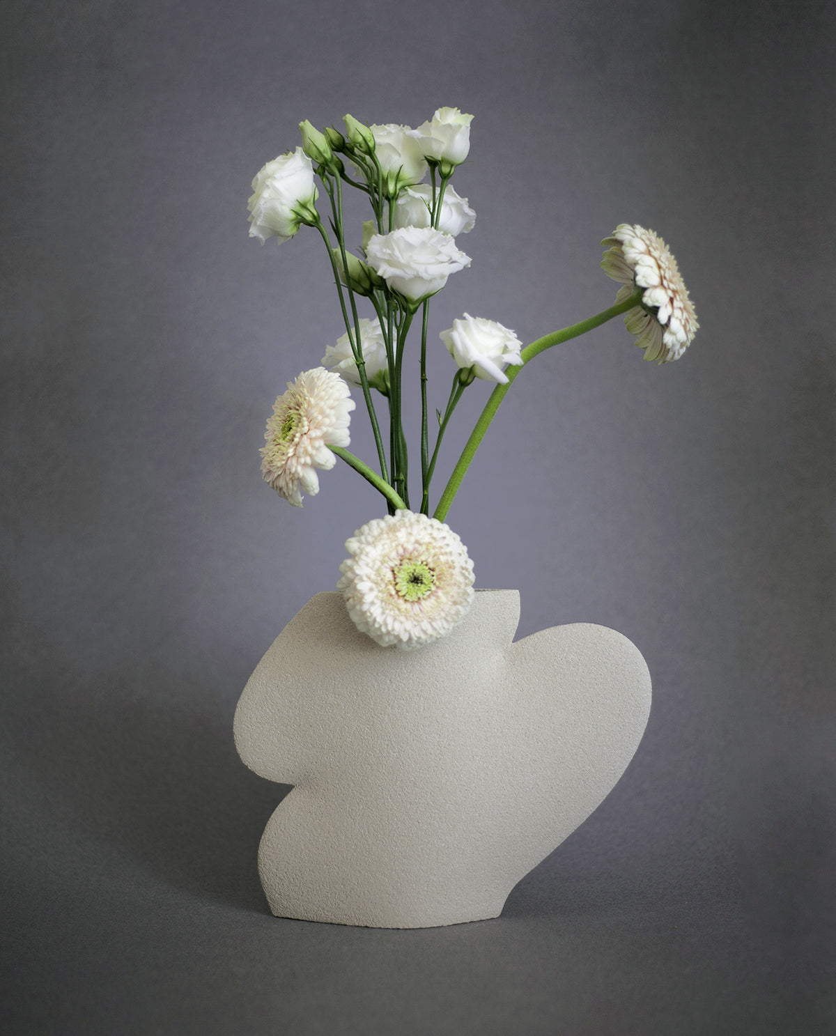 Handmade minimalist vase by INI CERAMIQUE featuring an original design and textured finish