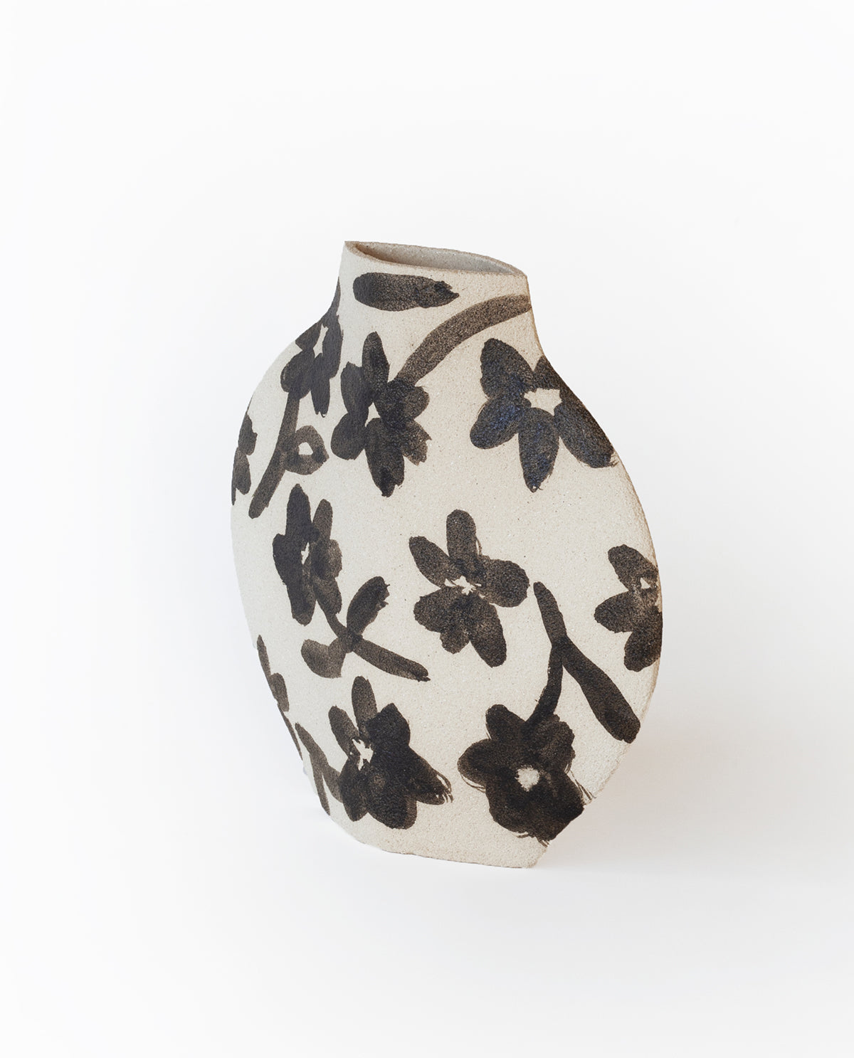 Hand-painted floral vase by INI CERAMIQUE with flowers patterns and textured finish
