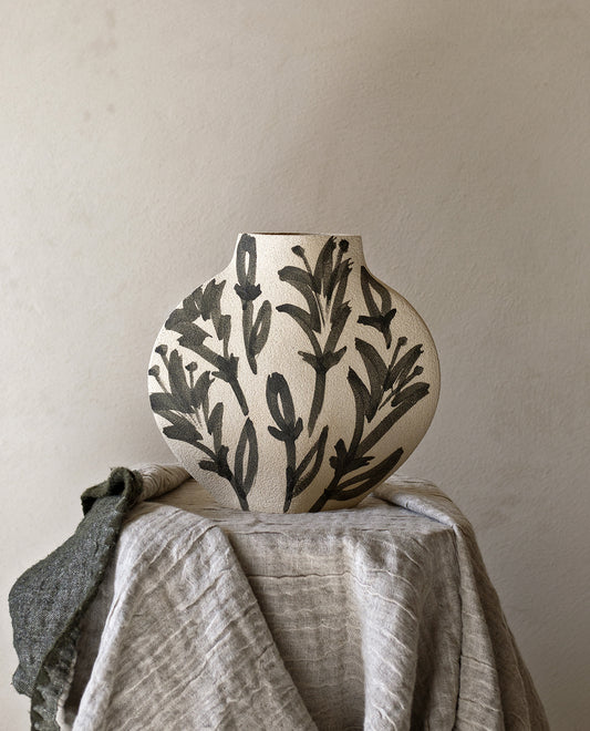 Hand-painted floral vase by INI CERAMIQUE with lilies patterns and textured finish