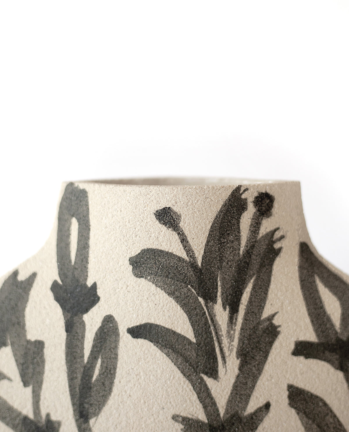 Hand-painted floral vase by INI CERAMIQUE with lilies patterns and textured finish