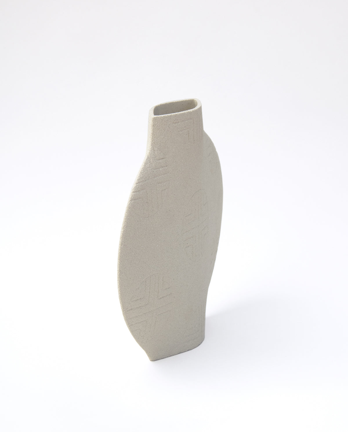 Handmade Korean vase by INI CERAMIQUE with traditional sculptural patterns and textured finish