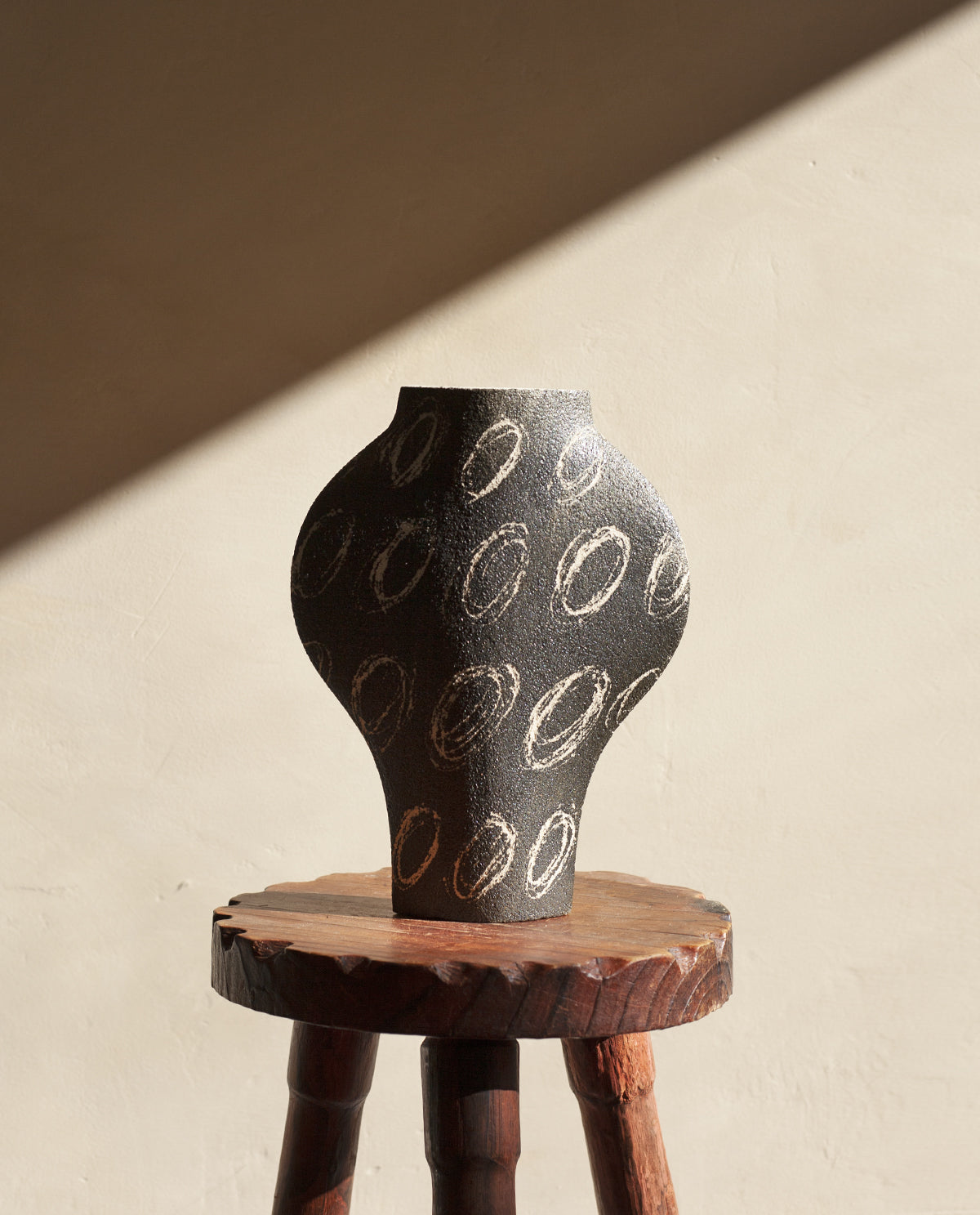 Hand-painted abstract vase by INI CERAMIQUE with geometric patterns and textured finish