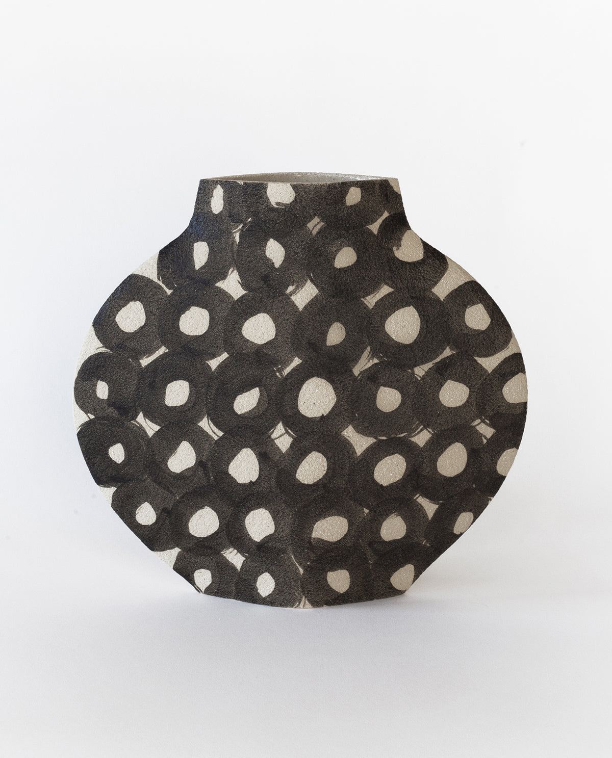 Hand-painted abstract vase by INI CERAMIQUE with geometric patterns and textured finish