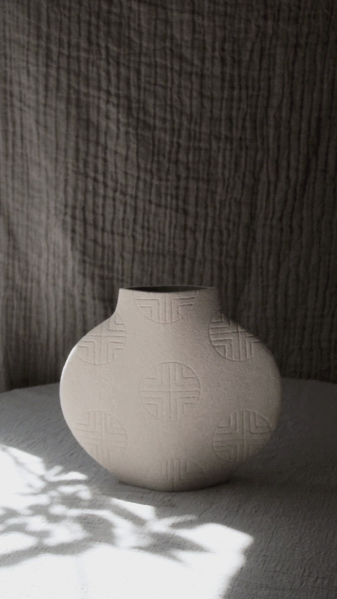 Handmade Korean vase by INI CERAMIQUE with traditional sculptural patterns and textured finish