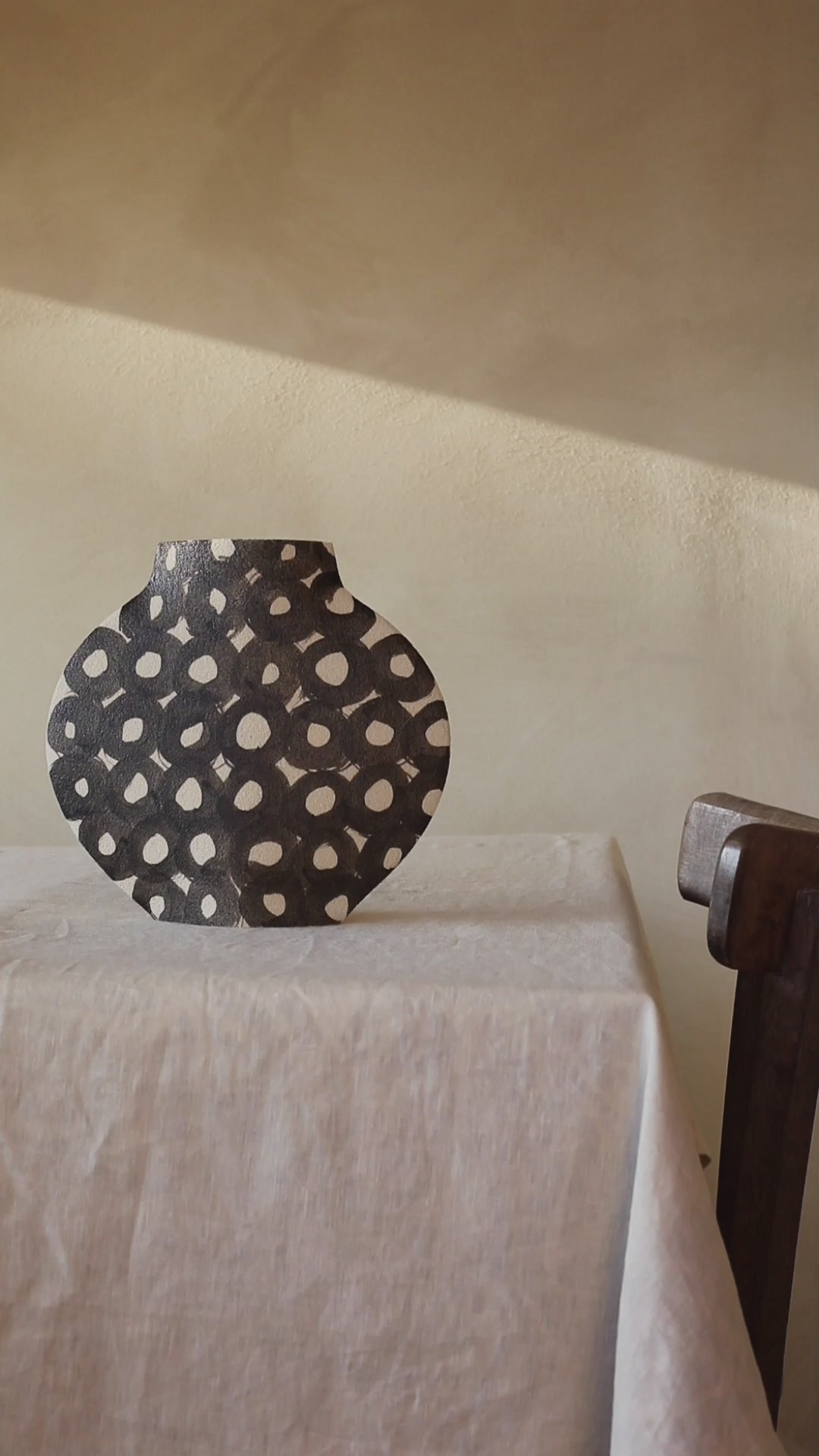 Hand-painted abstract vase by INI CERAMIQUE with geometric patterns and textured finish