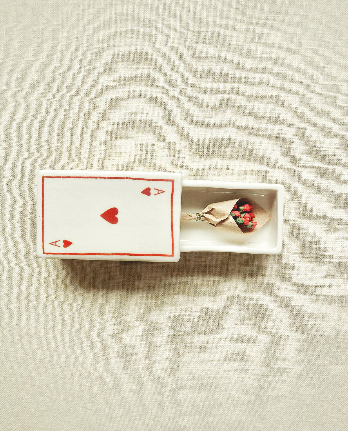 Ceramic matchbox with hand-drawn Ace of Hearts illustration