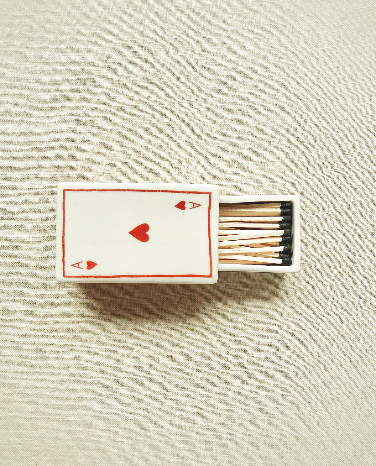 Ceramic matchbox with hand-drawn Ace of Hearts illustration