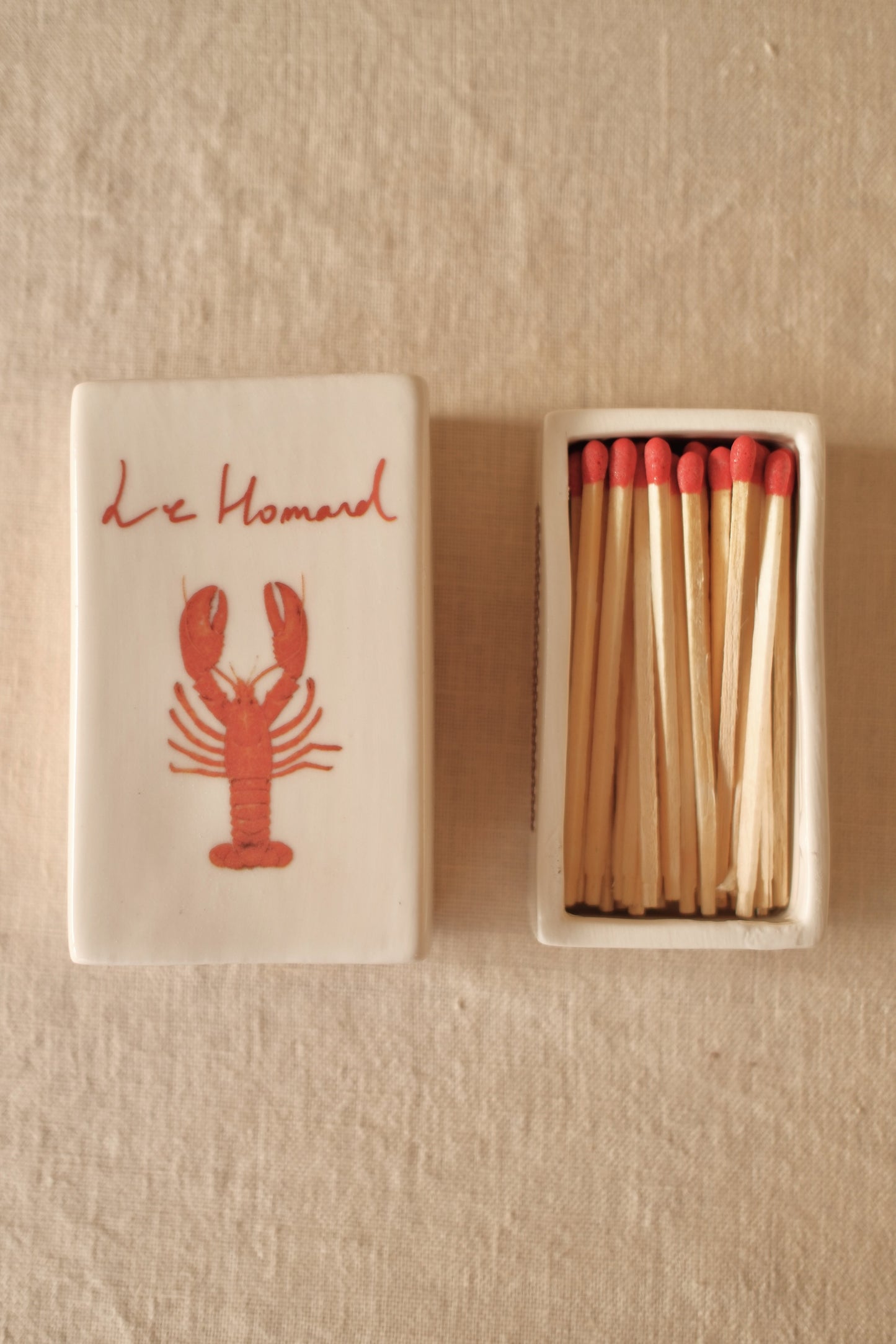 Decorative ceramic matchbox with hand-illustrated 'Le Homard', crafted by INI CERAMIQUE.