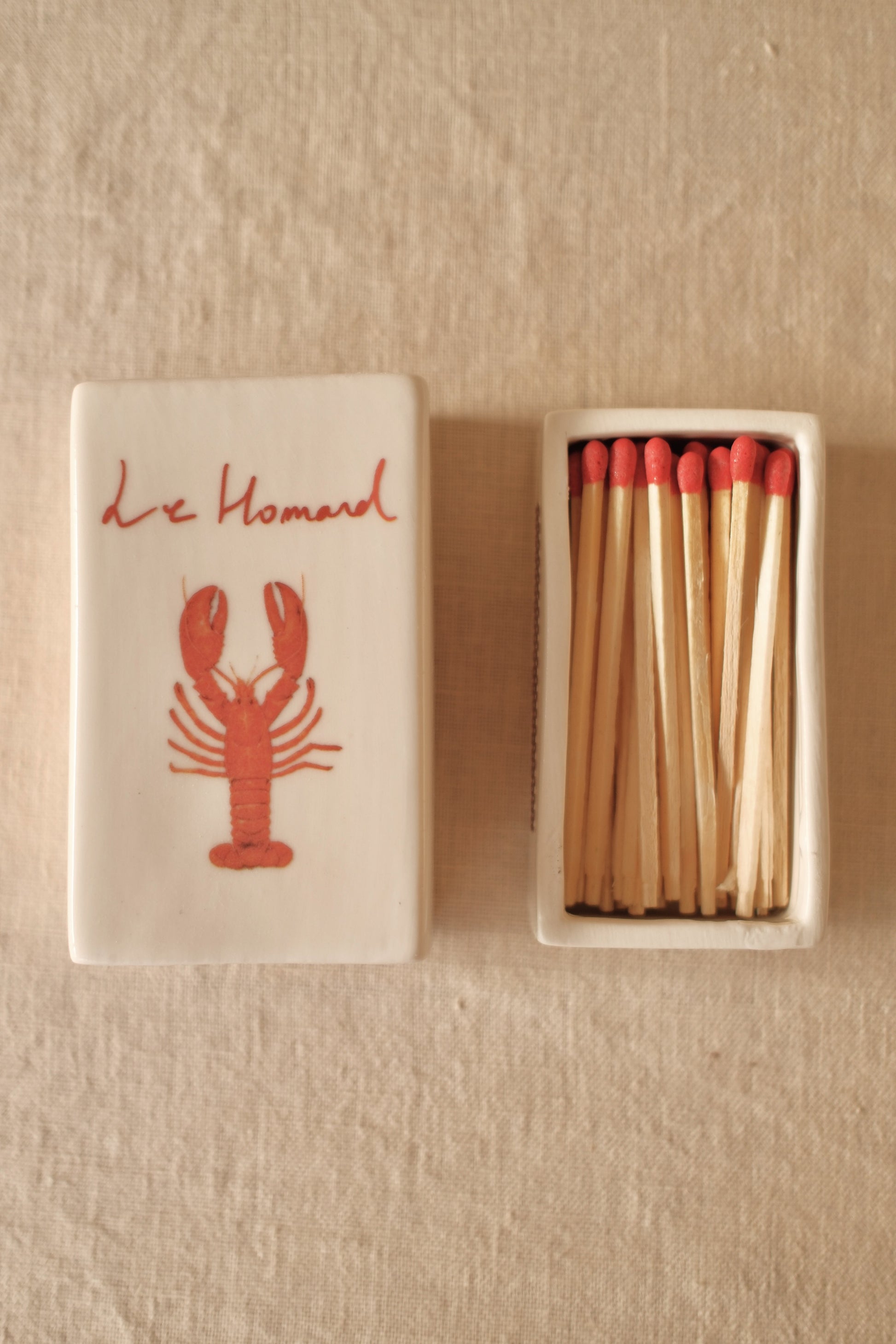 Decorative ceramic matchbox with hand-illustrated 'Le Homard', crafted by INI CERAMIQUE.
