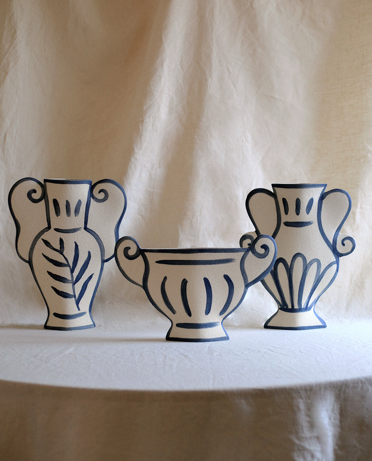 Hand-painted greek vase by INI CERAMIQUE with leaf patterns and textured finish