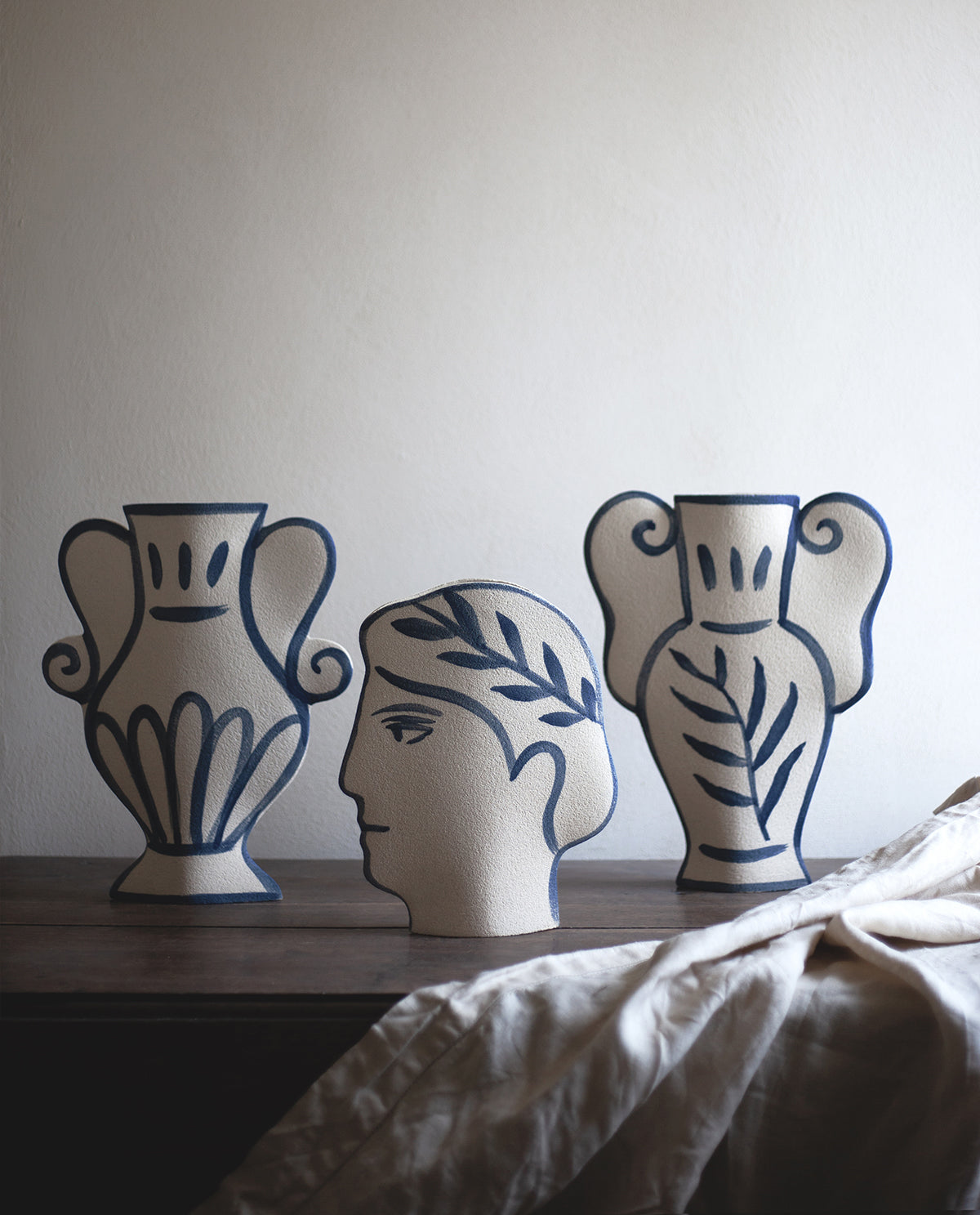 Hand-painted greek vase by INI CERAMIQUE with leaf patterns and textured finish