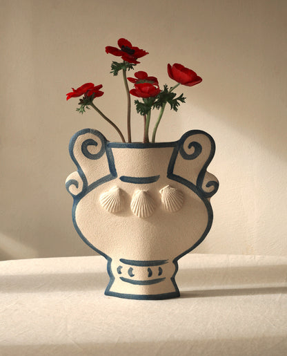 Hand-painted greek vase by INI CERAMIQUE with geometric patterns and shell sculptures