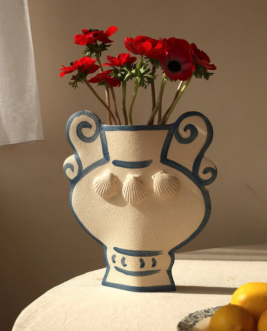 Hand-painted greek vase by INI CERAMIQUE with geometric patterns and shell sculptures