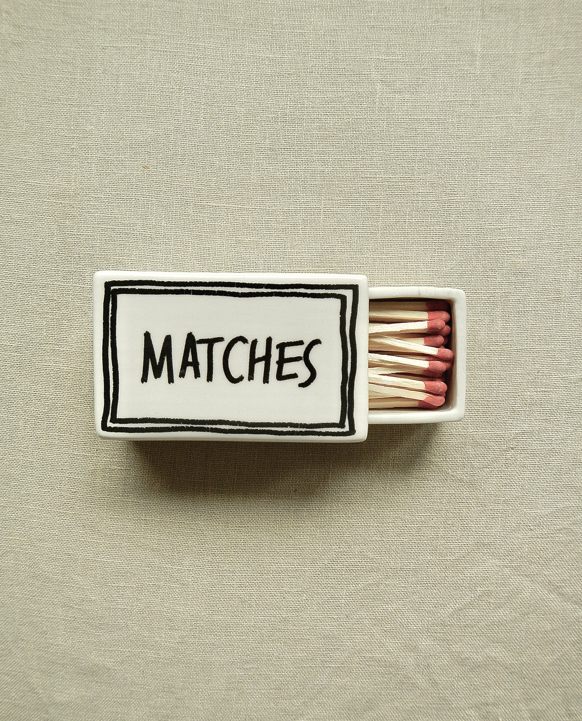 Ceramic matchbox with handwritten “Matches” design