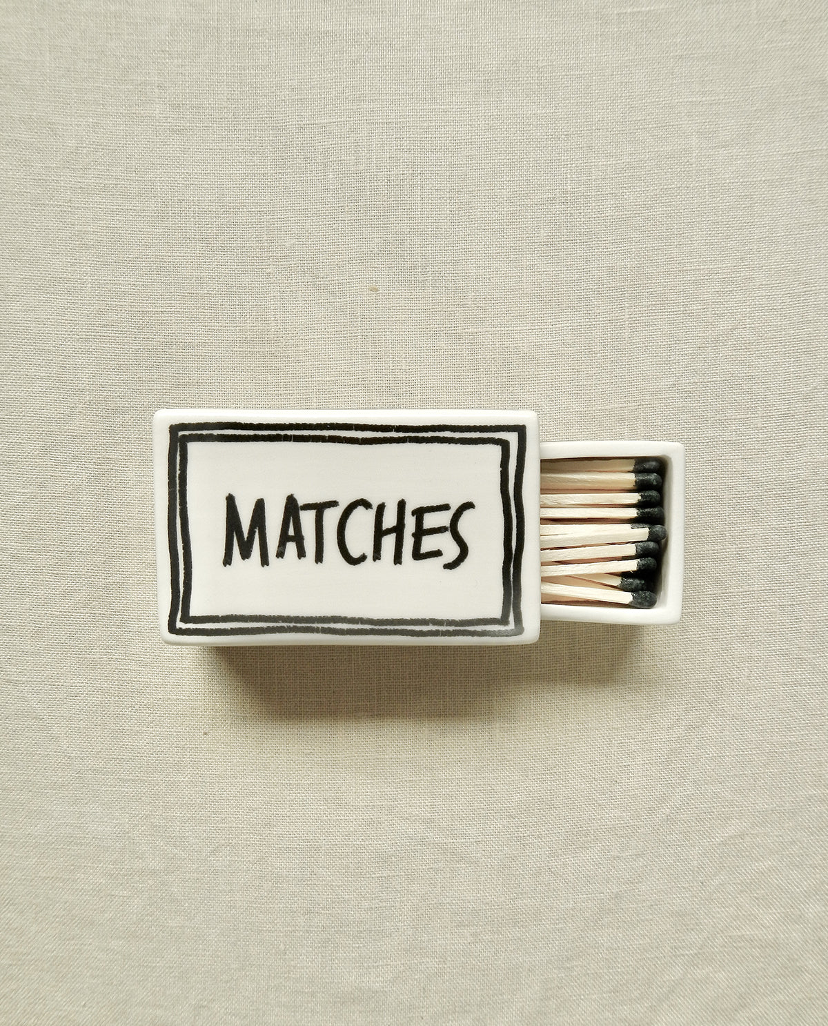 Ceramic matchbox with handwritten “Matches” design
