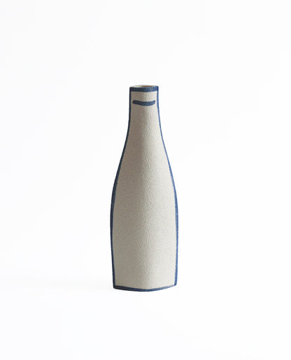 Hand-painted trompe l'oeil vase by INI CERAMIQUE with illustrative patterns and a textured finish