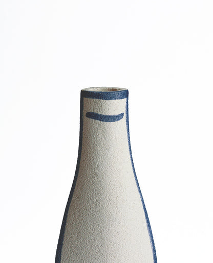 Hand-painted trompe l'oeil vase by INI CERAMIQUE with illustrative patterns and a textured finish