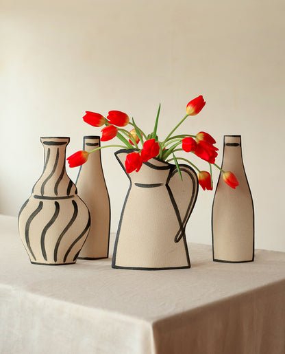 Hand-painted trompe l'oeil vase by INI CERAMIQUE with illustrative patterns and a textured finish