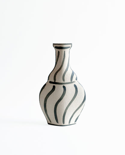 Hand-painted trompe l'oeil vase by INI CERAMIQUE with illustrative patterns and a textured finish