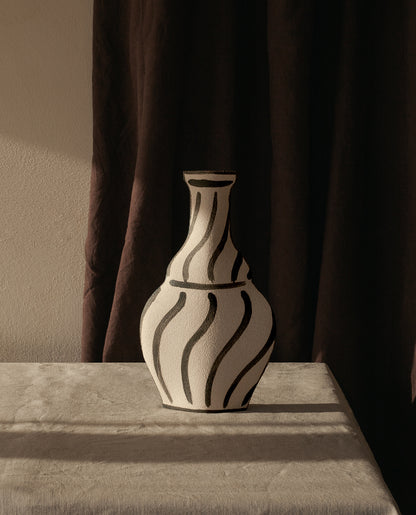 Hand-painted trompe l'oeil vase by INI CERAMIQUE with illustrative patterns and a textured finish