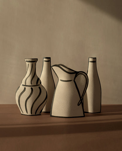 Hand-painted trompe l'oeil vase by INI CERAMIQUE with illustrative patterns and a textured finish