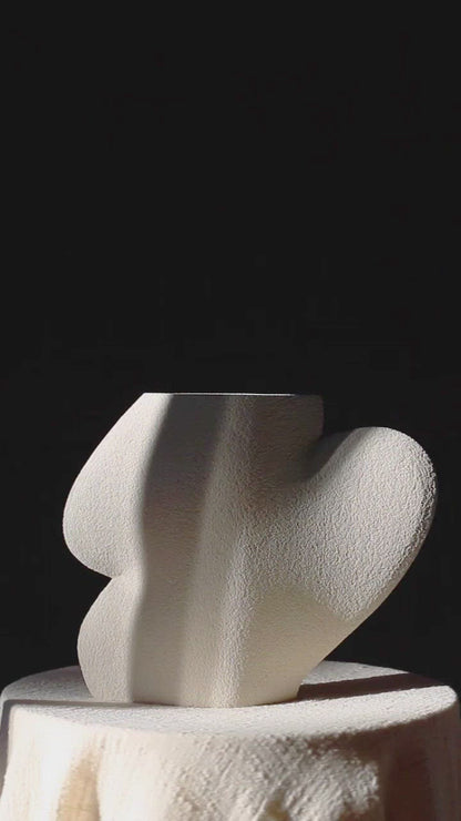 Handmade minimalist vase by INI CERAMIQUE featuring an original design and textured finish